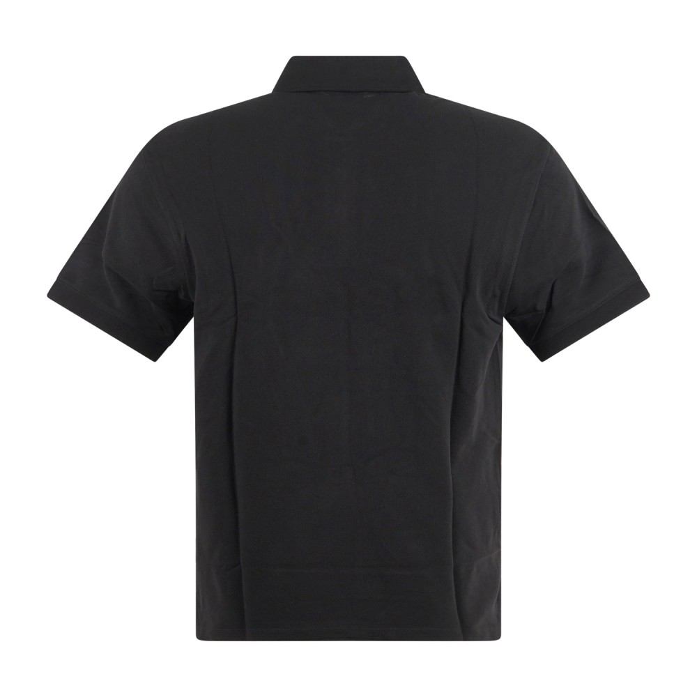 Armani Exchange - Polo nera maniche corte in piqué con patch logo oro sul petto